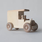 Wooden piggy bank truck featuring two removable peg people | Salt Air Supply