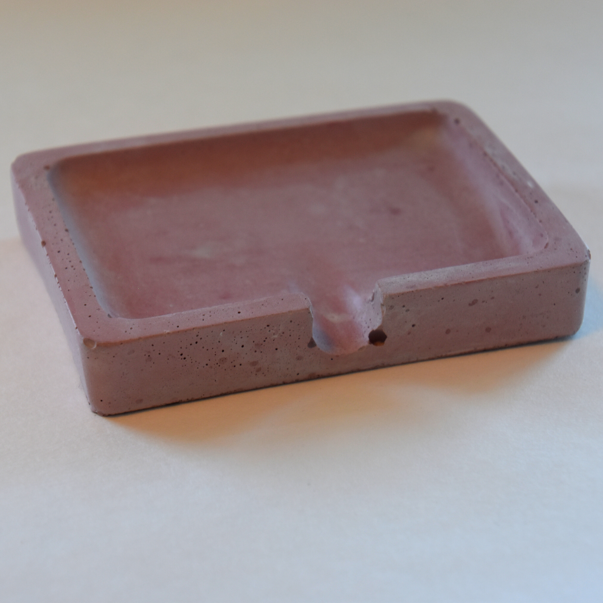This pink soap dish has a fun vintage look.